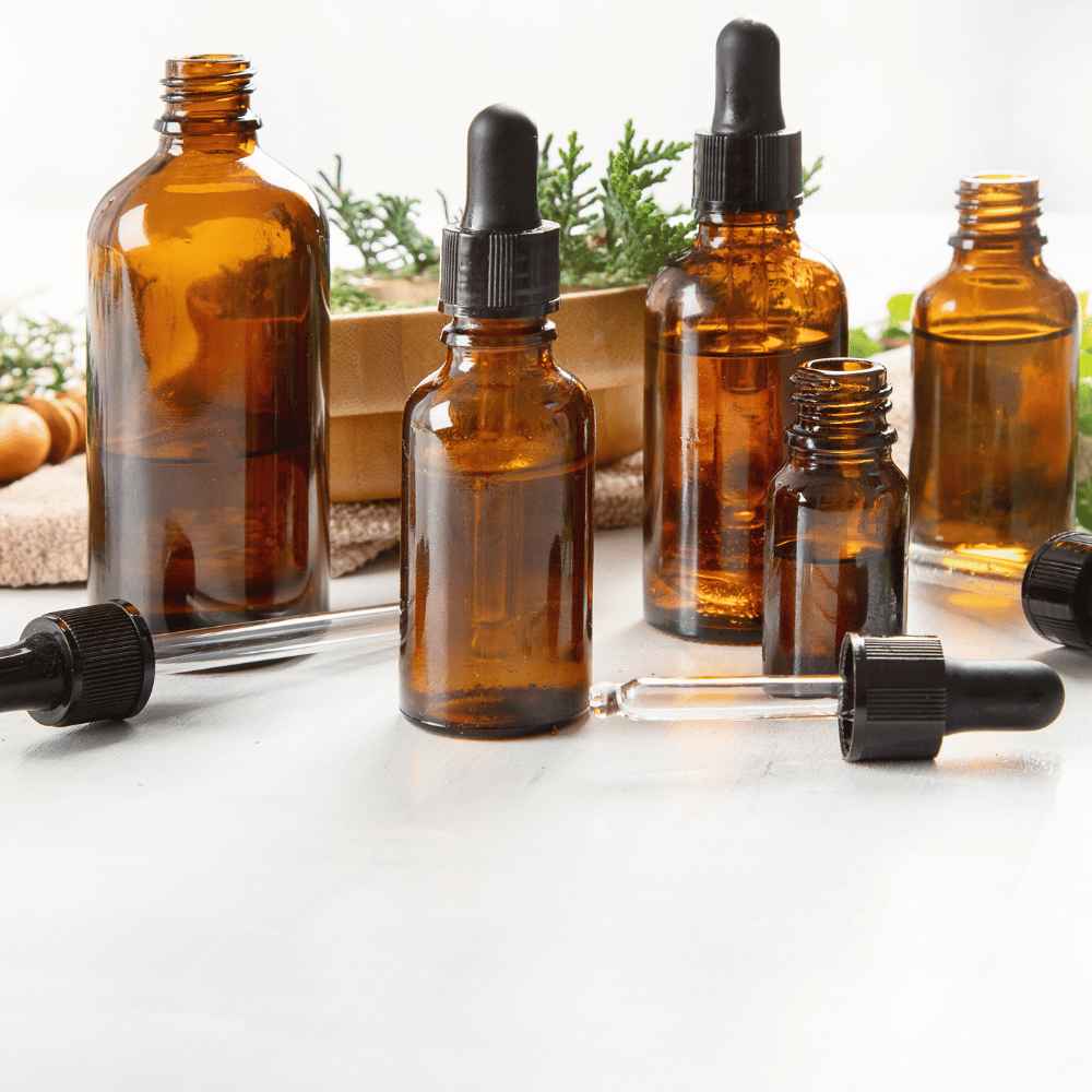 closeup of amber-colored serum bottles and droppers