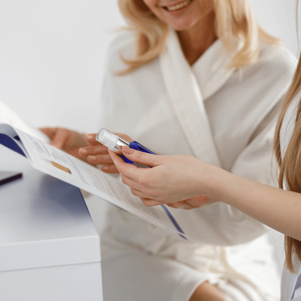 woman getting a customized skincare routine from a dermatologist